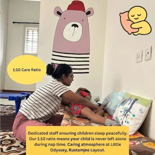 Dedicated staff caring for a child, maintaining a 1:10 ratio at Little Odyssey, Whitefield